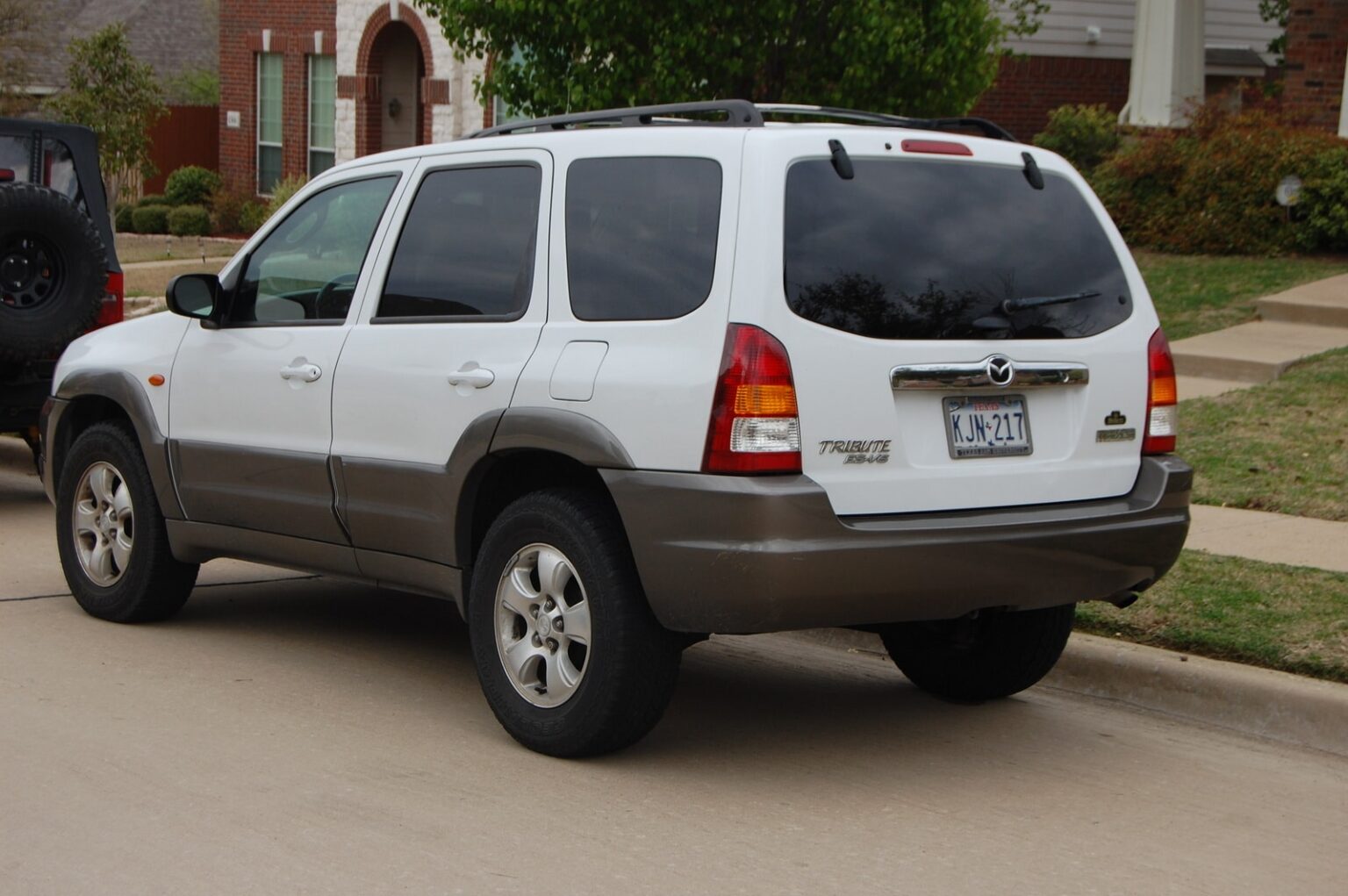 Manual de Usuario MAZDA Tribute 2001 en PDF Gratis