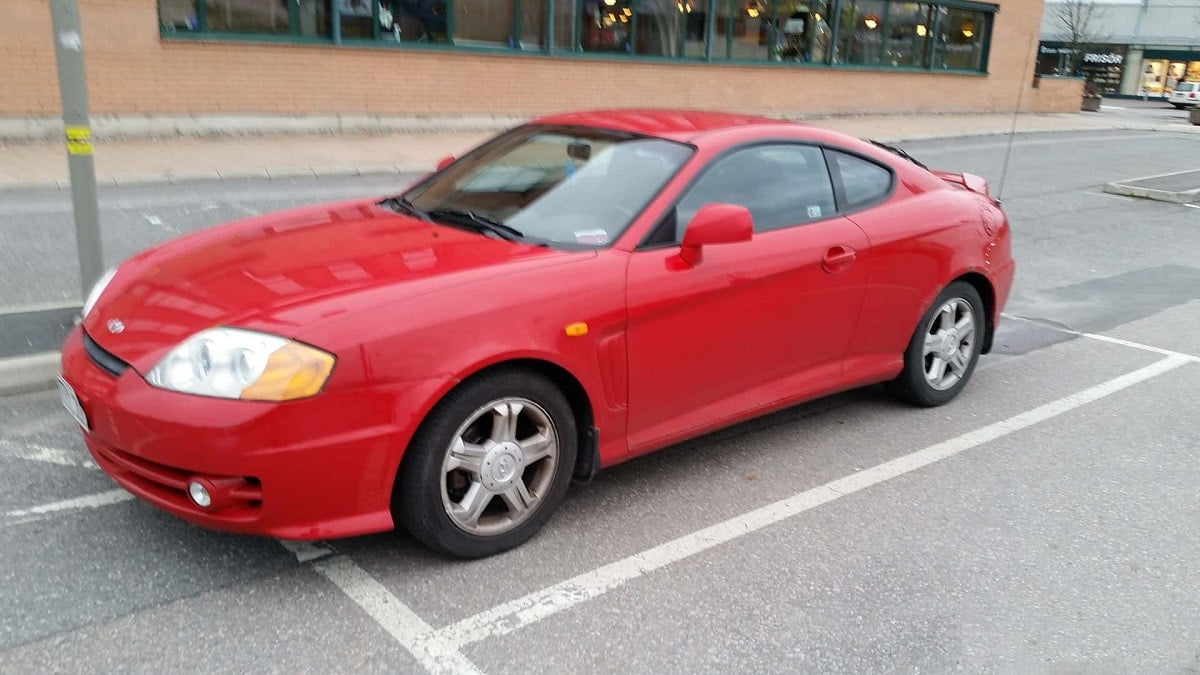 Manual HYUNDAI COUPE 2003 de Usuario