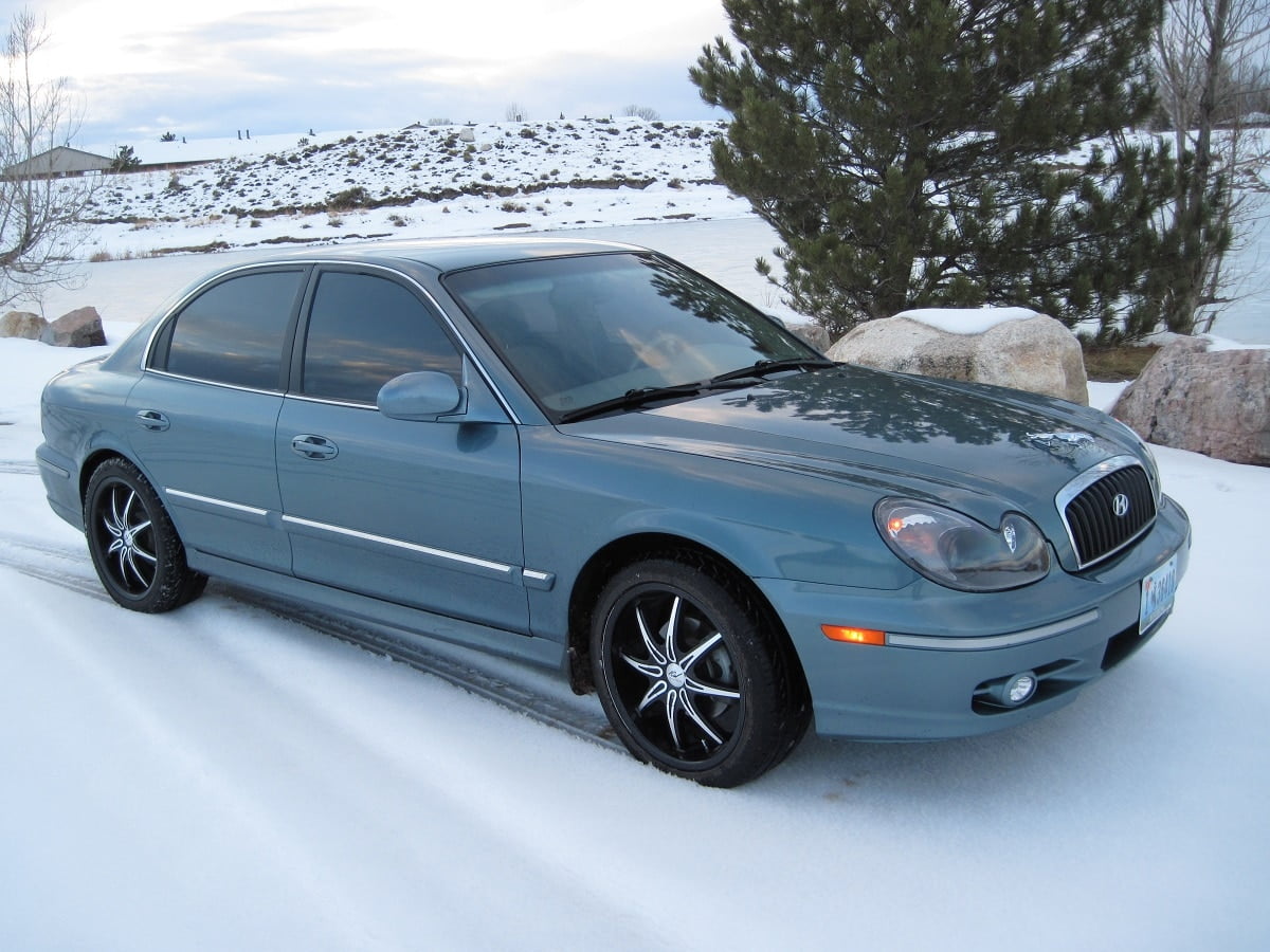 Manual HYUNDAI AZERA 2005 de Usuario