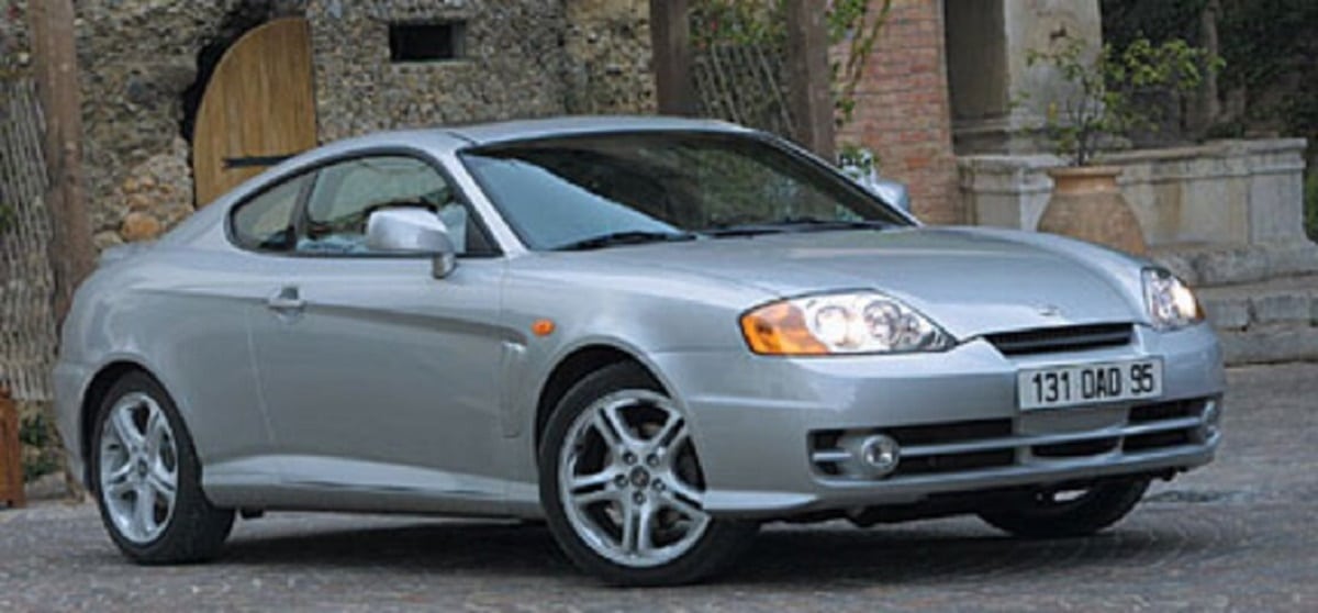 Manual HYUNDAI TIBURON 2003 de Usuario